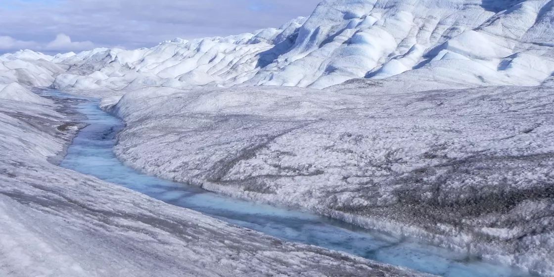 Fig. 3. Greenland ice sheet with melting ice flow (magnetix / Shutterstock).