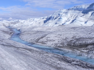Fig. 3. Greenland ice sheet with melting ice flow (magnetix / Shutterstock).